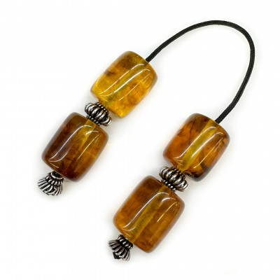 Μπεγλέρι με 4 χάντρες 25x20mm από σκόνη Κεχριμπάρι και ρητίνη διάφανο μελί με καφέ νερά